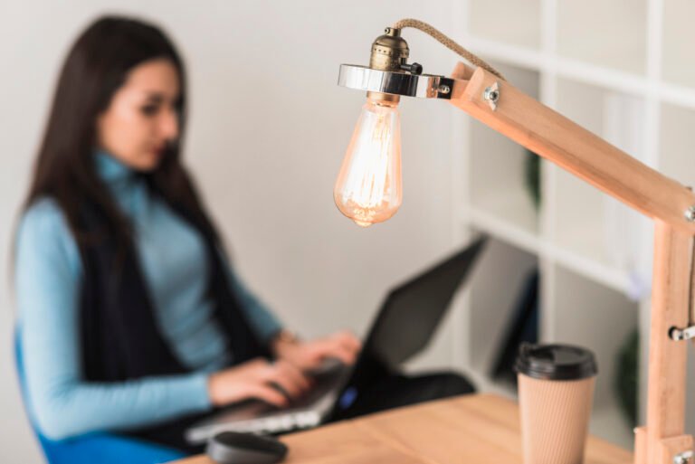 table-lamp-near-working-woman